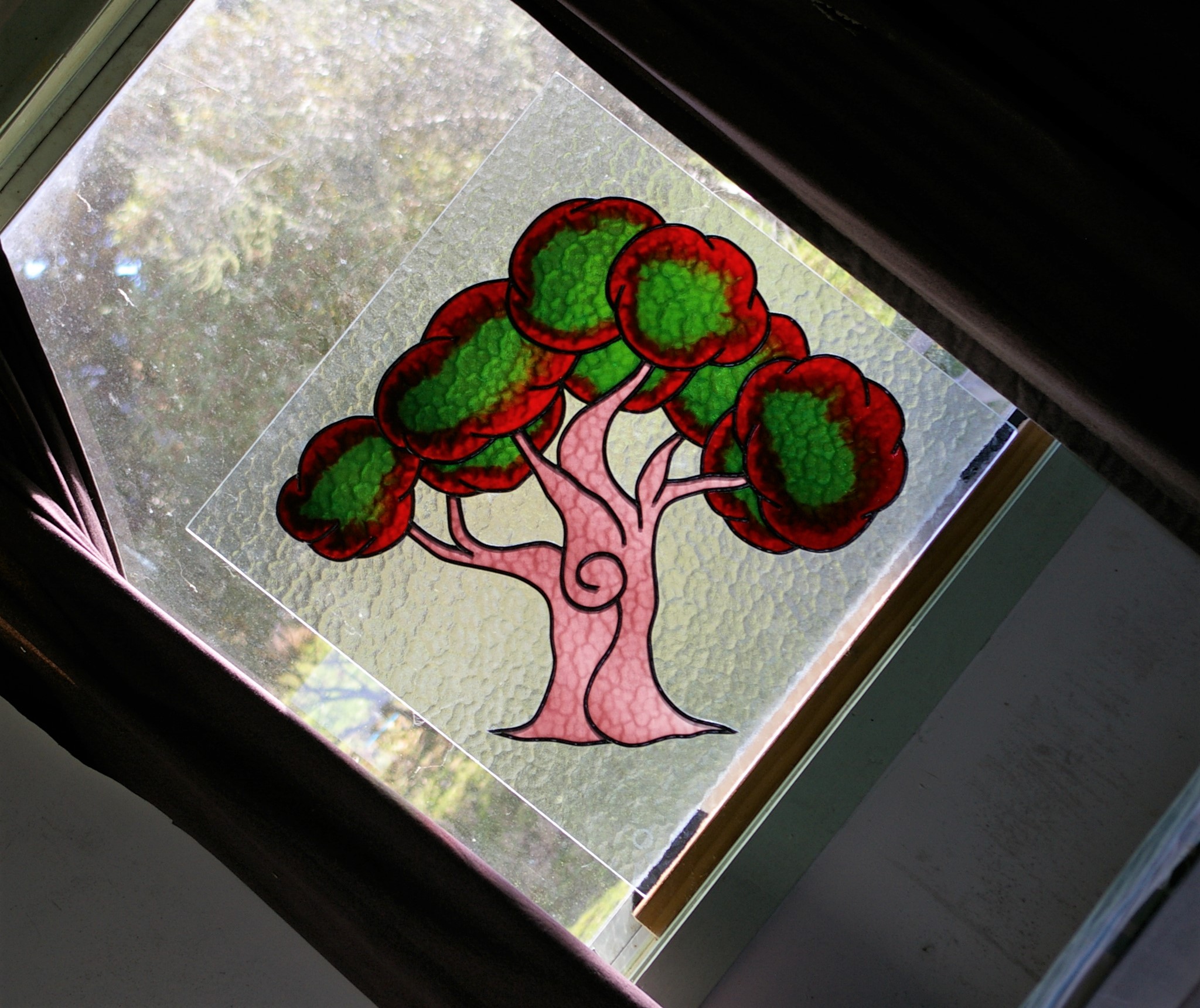 An image of a custom leadlight window design of the 'Tree of Life'.
